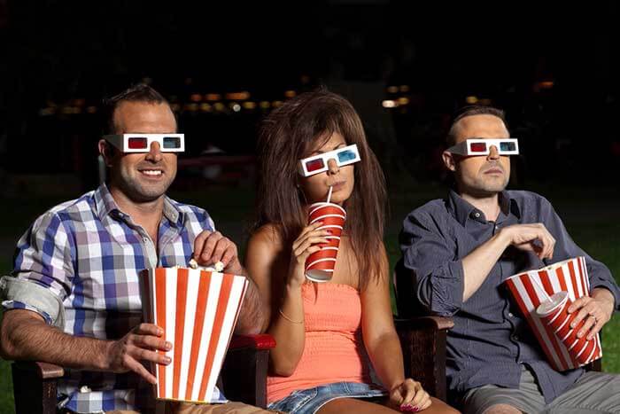 backyard-movie-night-pynx-eating-popcorn